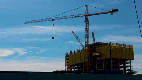 Two Cranes Moving at a Construction Site Stock-Footage 240531950