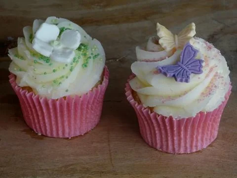 Two Cream Cup Cakes Stock Photos