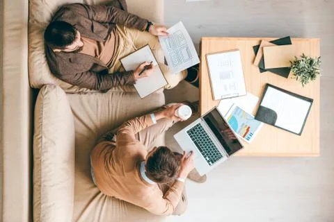 Two creative interface designers developing brand new software for smartphones Stock Photos