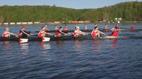 Two Crew boats racing down the Hudson with freight train Stock-Footage 80647934