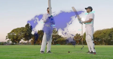 Two cricketers adjusting pads, practicing bat lifts for sports, blue world-map Stock Footage 327269563