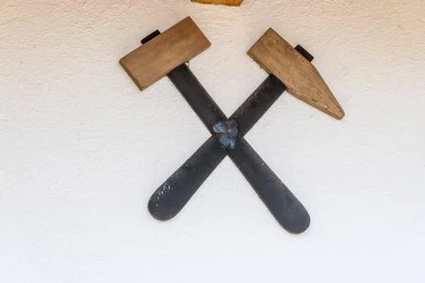 Two crossed hammers Stock Photos