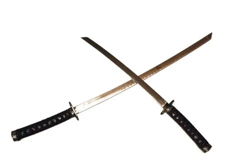 Two crossed samurai swords, isolate on white background Stock Photos