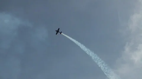 Two crossing Extra 330 LT stuntflying airshow Stock Footage 39197506