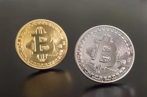 Two cryptocurrency Bitcoin coins Stock Photos