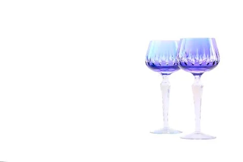 Two crystal glasses for champagne and wine on a white background Stock Photos