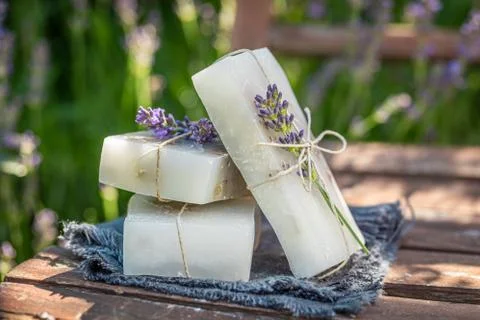 Two cubes of lavender soap wrapped in a string Stock Photos