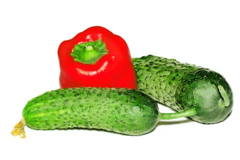 Two cucumber and pepper Stock Photos