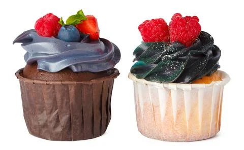 Two cupcakes isolated on white background close up Stock Photos