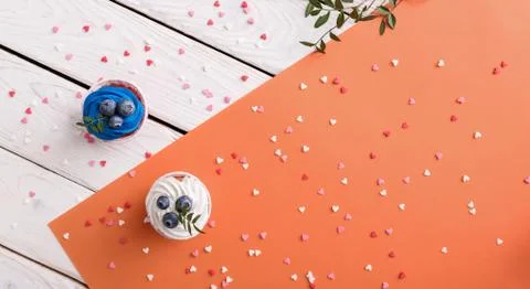 Two cupcakes on a table, top view Stock Photos