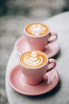 Two cups of cappuccino. Stock Photos