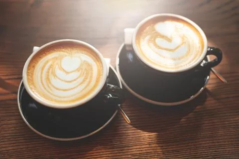 Two cups of cappuccino. Stock Photos