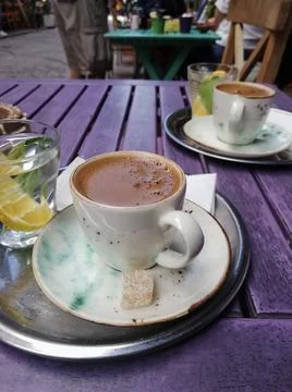 Two cups of coffe on the table in the street cafe outdoor Stock Photos