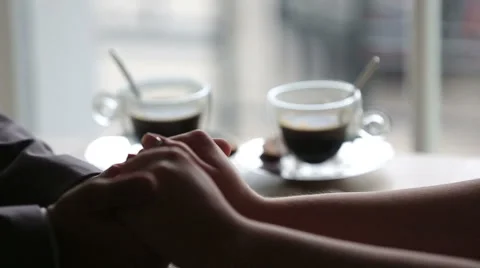 Two cups of coffee and tingling hands Stock Footage