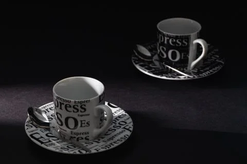 Two cups of coffee on the black table 库存照片
