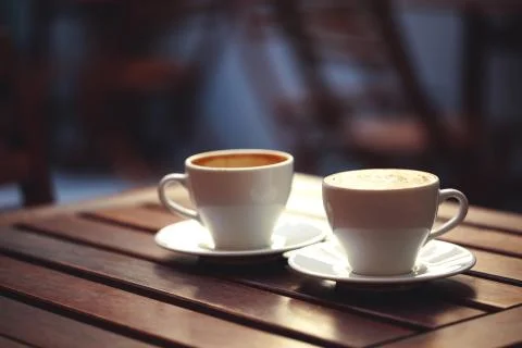 Two cups of coffee in cafe. Stock Photos