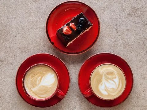 Two cups of coffee with chocolate cake. Breakfast with coffee Stockfoto's
