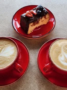 Two cups of coffee with chocolate cake. Breakfast with coffee Stock Photos