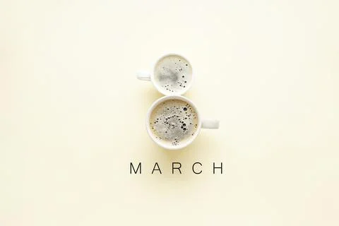 Two cups of coffee in the form of number 8, flat lay. International Women's D Stock Photos