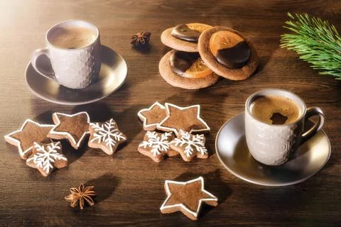 Two Cups of Coffee with Gingerbread Cookies and Pine Branch Stock Photos