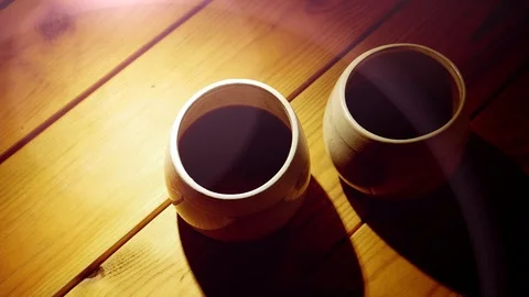 Two Cups Of Coffee Standing On Wooden Table Stock Footage 114823259