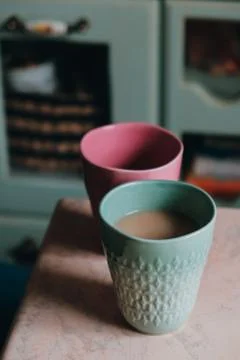 Two cups of coffee on stone table Stock Photos