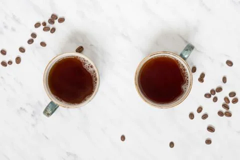 Two cups of coffee, top view Stock Photos