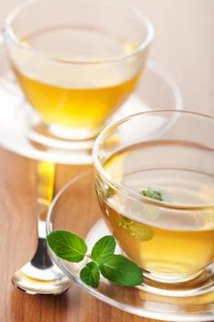Two cups of green tea with mint Stock Photos