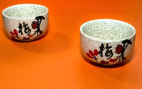 Two cups with a hieroglyph Stock Photos