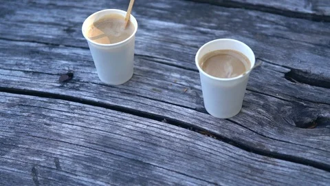 Two cups of hot takeaway coffee Video stock 96456883