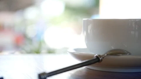 Two cups of invigorating coffee on the table with a piece of sweet tasty cake Stock Footage 96610857