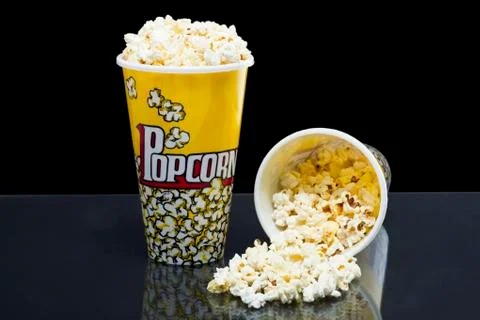 Two cups of popcorn Stock Photos
