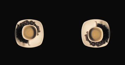 Two cups with rotating coffee Stock Footage 103756590