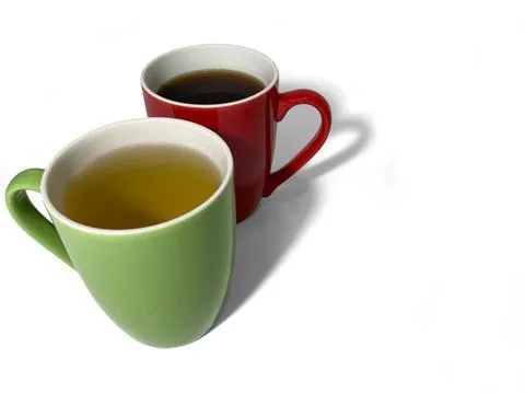 Two cups stand on a white background. In one brewed green tea, in the second Stock Photos