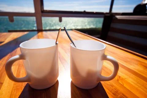 Two cups on table Stock Photos