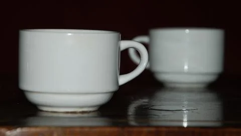 Two cups on the table Stock Photos