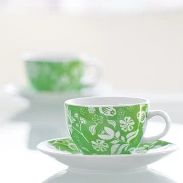 Two cups of tea on a glass table Stock Photos