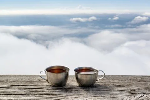 Two cups of tea high in the mountains Stock Photos