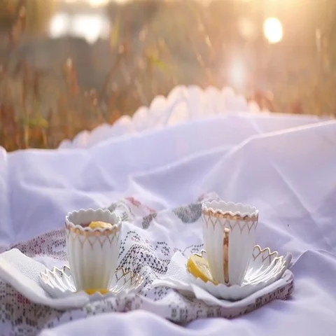 Two cups of tea with lemon at sunset Stock Footage 69542328