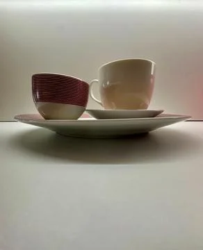 Two cups of tea with plates Stock Photos