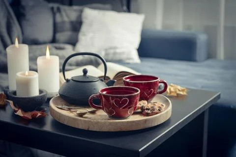 Two cups of tea on a serving tray on coffee table. Stock Photos