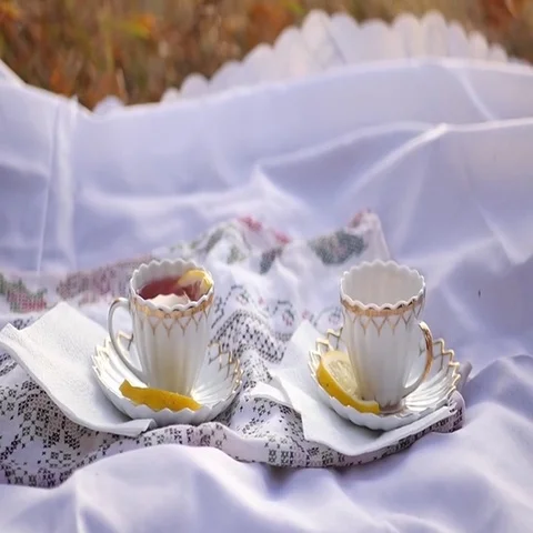 Two cups of tea on the tablecloth Stock Footage 69541161