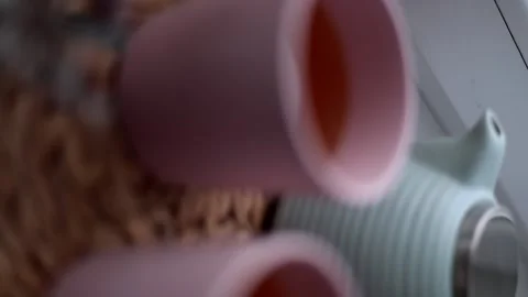 In two cups is tea, taken off the hands. Stock Footage 167951173