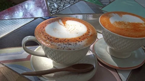 Two cups of Thai tea latte Stock Footage 76639782