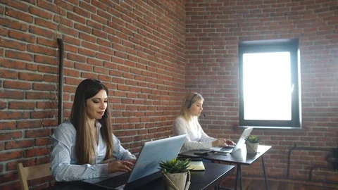 Two customer service representatives at work Stock Footage 70839249