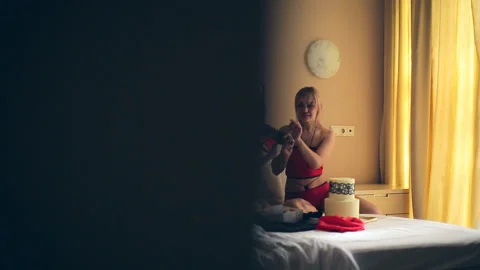 Two cute girls posing in the interior of a bedroom in underwear Video stock 90525347
