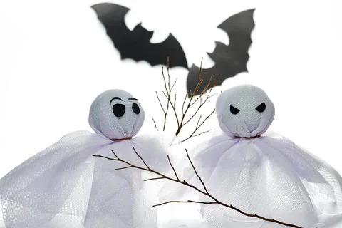 Two cute handmade ghost dolls with bats, a creative Halloween decoration co.. Stock Photos