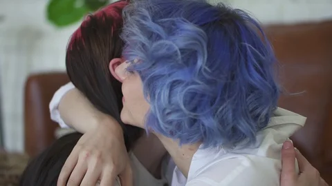 Two cute young age lesbian young womans hugging closeup. Spbd woman comforting Stock Footage 128287837