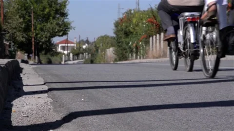 Two cyclists are moving back home after they went shopping Stock Footage 58811186