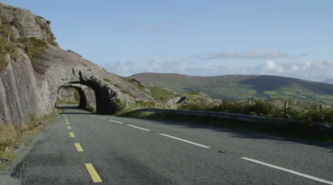 Two cyclists on a mountain road Stock Footage 55826653